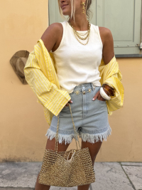 Short en jean clair à franges