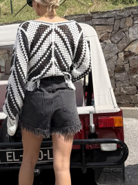 Short en jean noir à franges