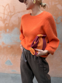 Orange/burgundy striped clutch