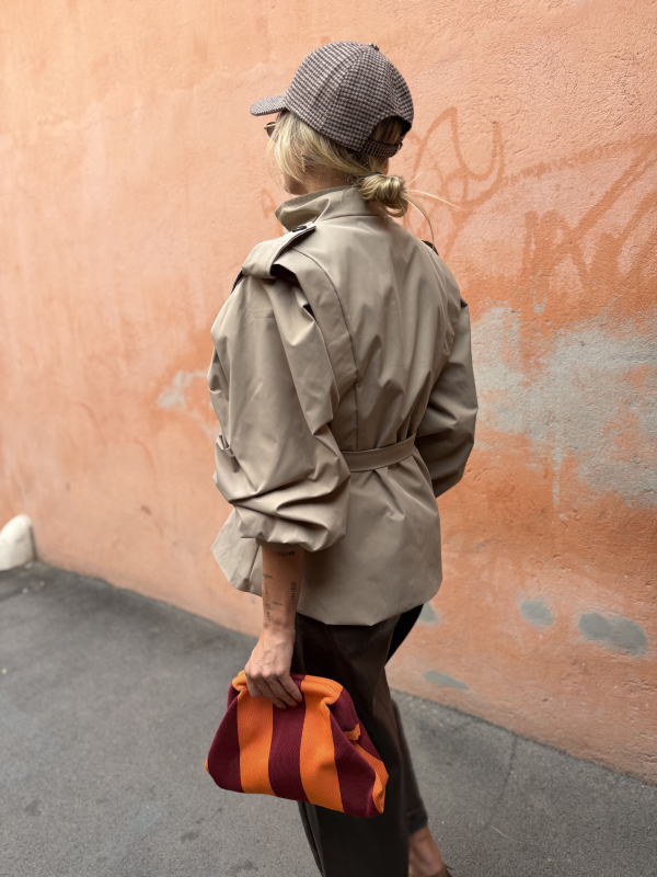 Orange/burgundy striped clutch