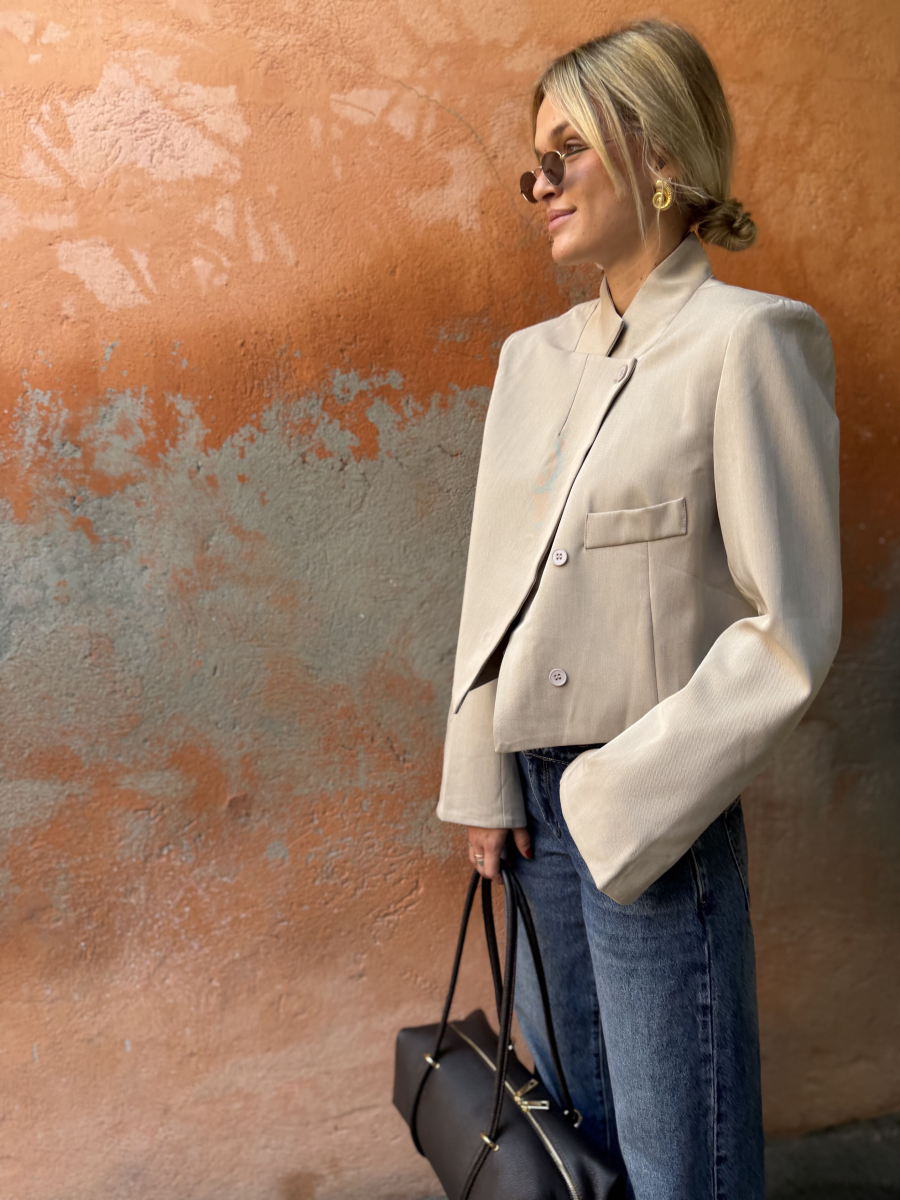 Asymmetrical beige blazer