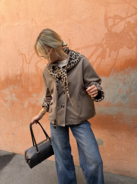 Taupe trench coat with leopard scarf